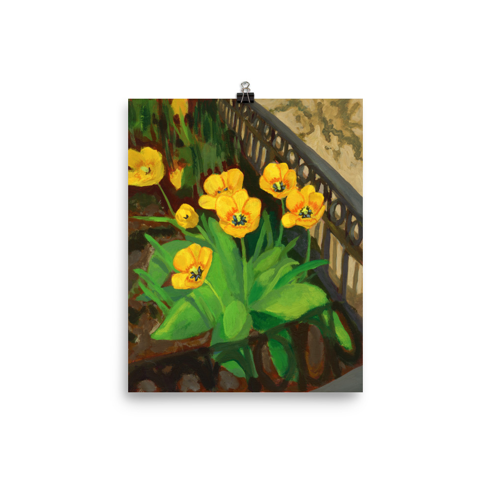 Tulips brighten a tree bed